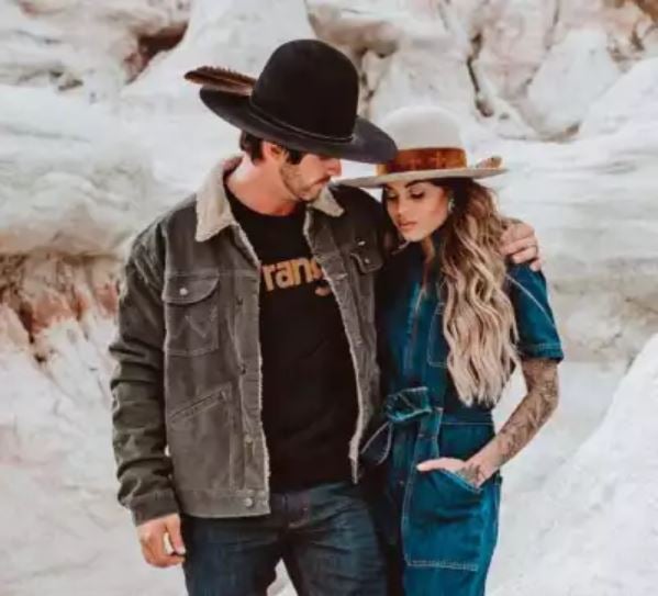 man and women wearing Wrangler clothing